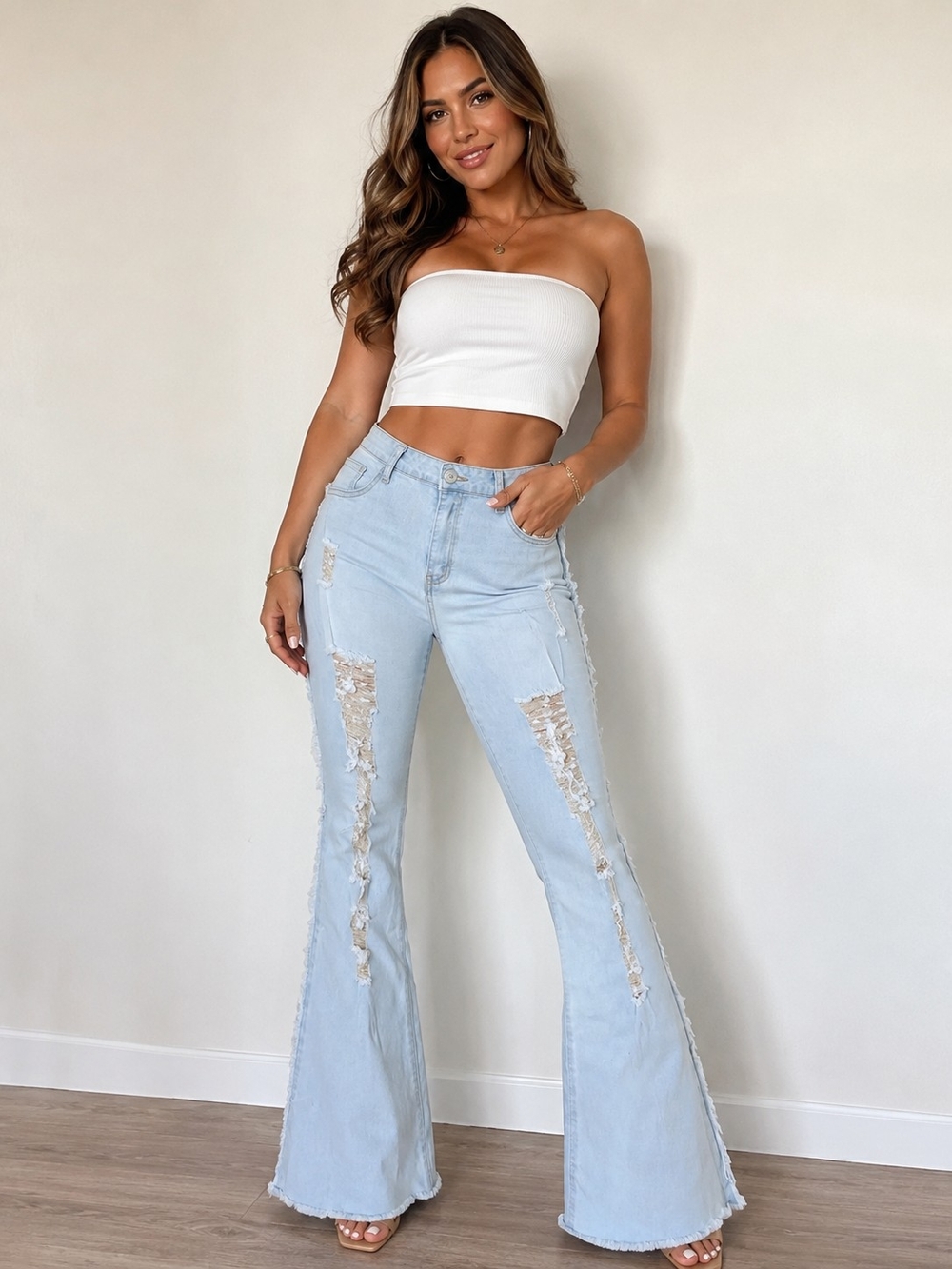 High-Rise Light Wash Distressed Flare Jeans - Women W34